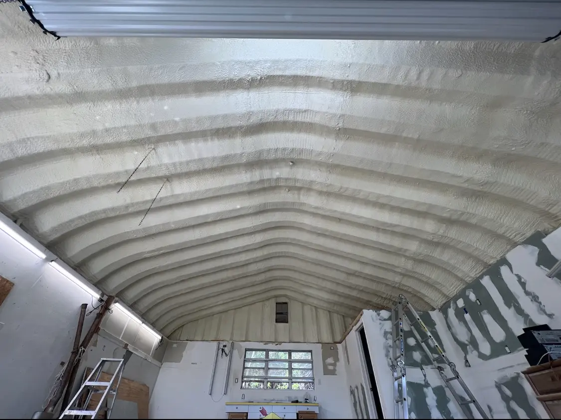 Spray polyurethane foam applied to the underside of a metal roof deck in Gold River